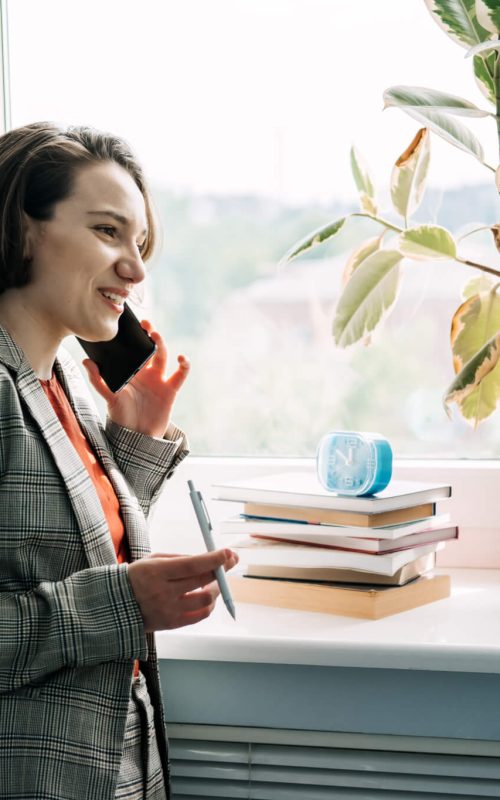 legal-business-consultant-legal-advisor-female-lawyer-businesswoman-talking-on-cell-phone